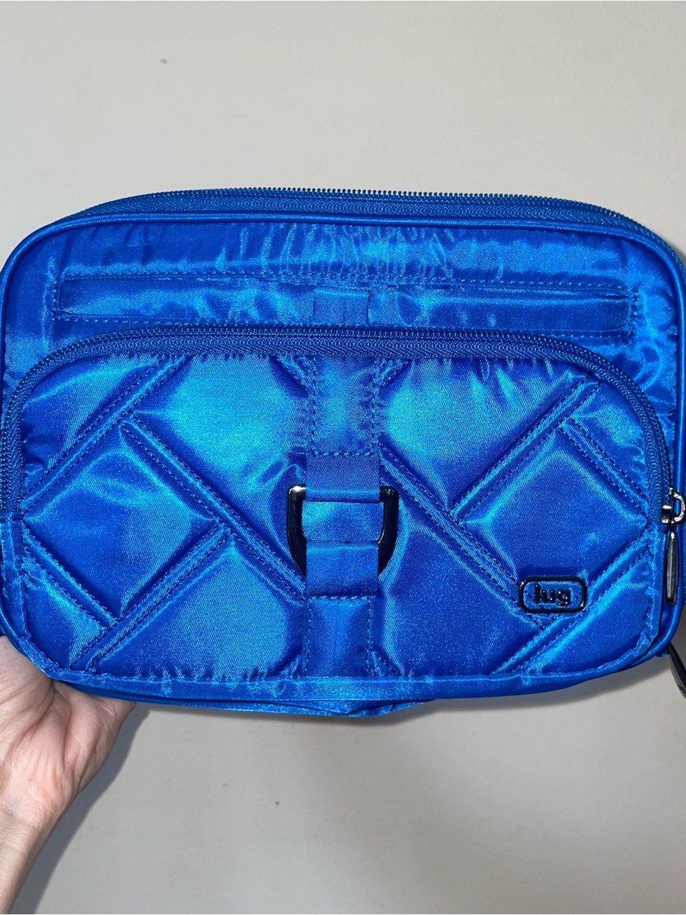 lug Quilted Cosmetic Pouch in Bright Blue with crossbody strap